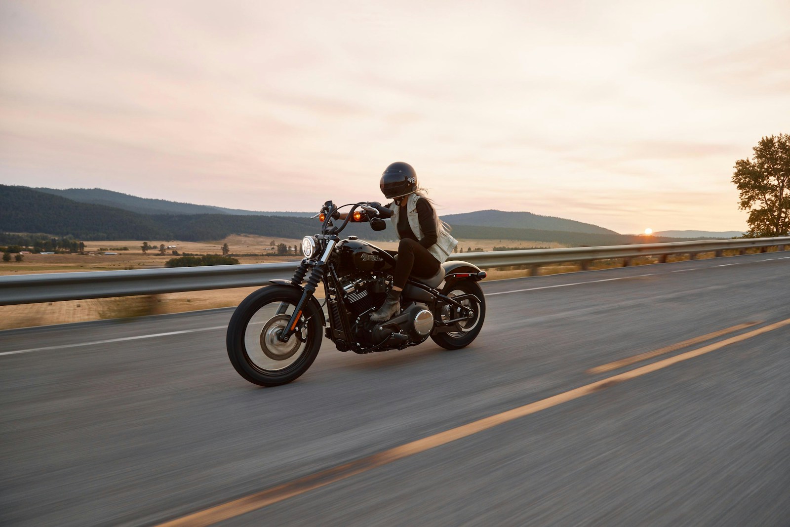 Motorcycle and rider representing multiple vehicle service categories