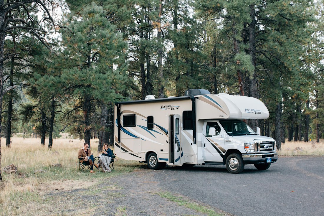 RV trailer set up at a campsite for service