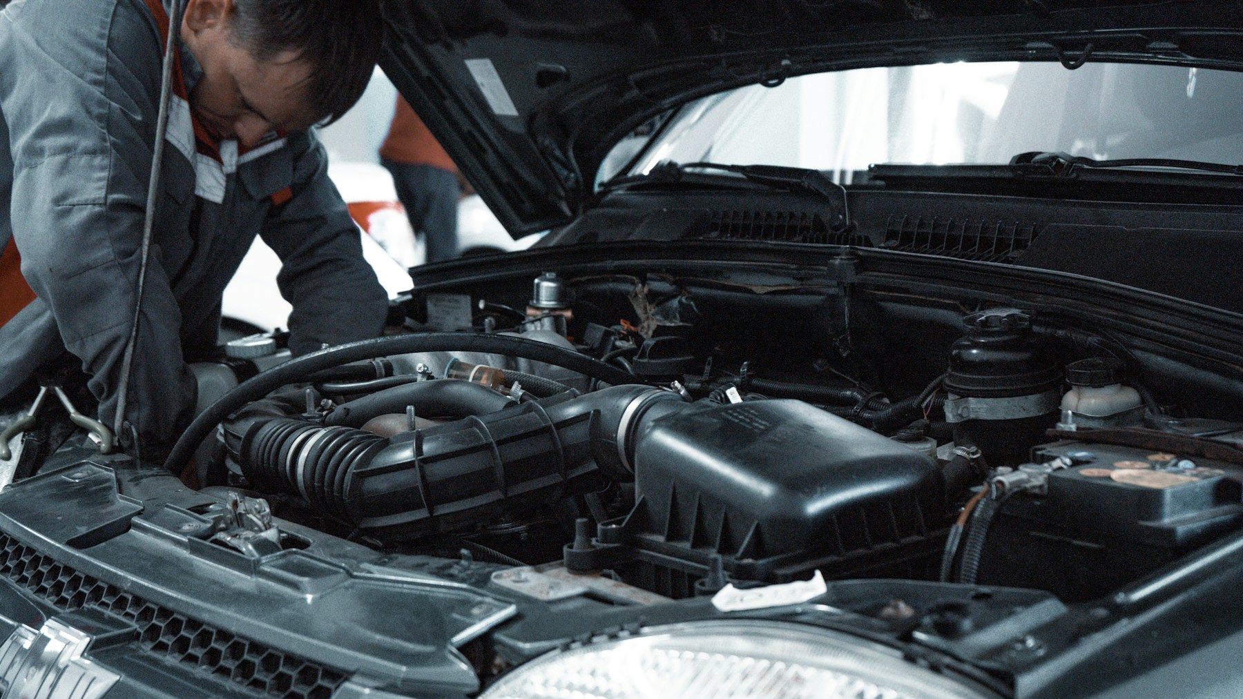 Automotive professional working in a service garage